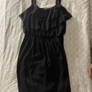 Black, knee length dress. Sheer material, worn once